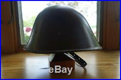 Dutch M38 KNIL helmet WWII era with leather liner and rear flap for skirt