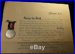 KING GEORGE VI ROYAL CERTIFICATE SIGNED on May 11, 1937 & CORONATION MEDAL LOT