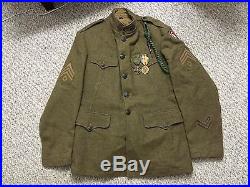 M1918 tunic 372nd Inf, Hand patch, 1st sgt, 2 OS stripes, French +US medals