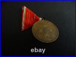 The Cross of Recognition Medal on Storyboard Latvia 1938