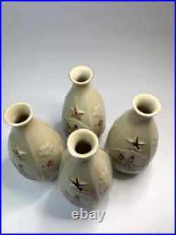 WWII Imperial Japanese Army China Incident Commemorative Sake Bottles Set of 4 WWII Imperial Japanese Army China Incident Commemorative Sake Bottles Set of 4